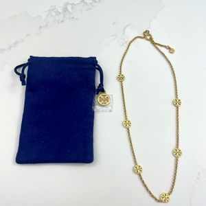 Tory Burch gold necklace.